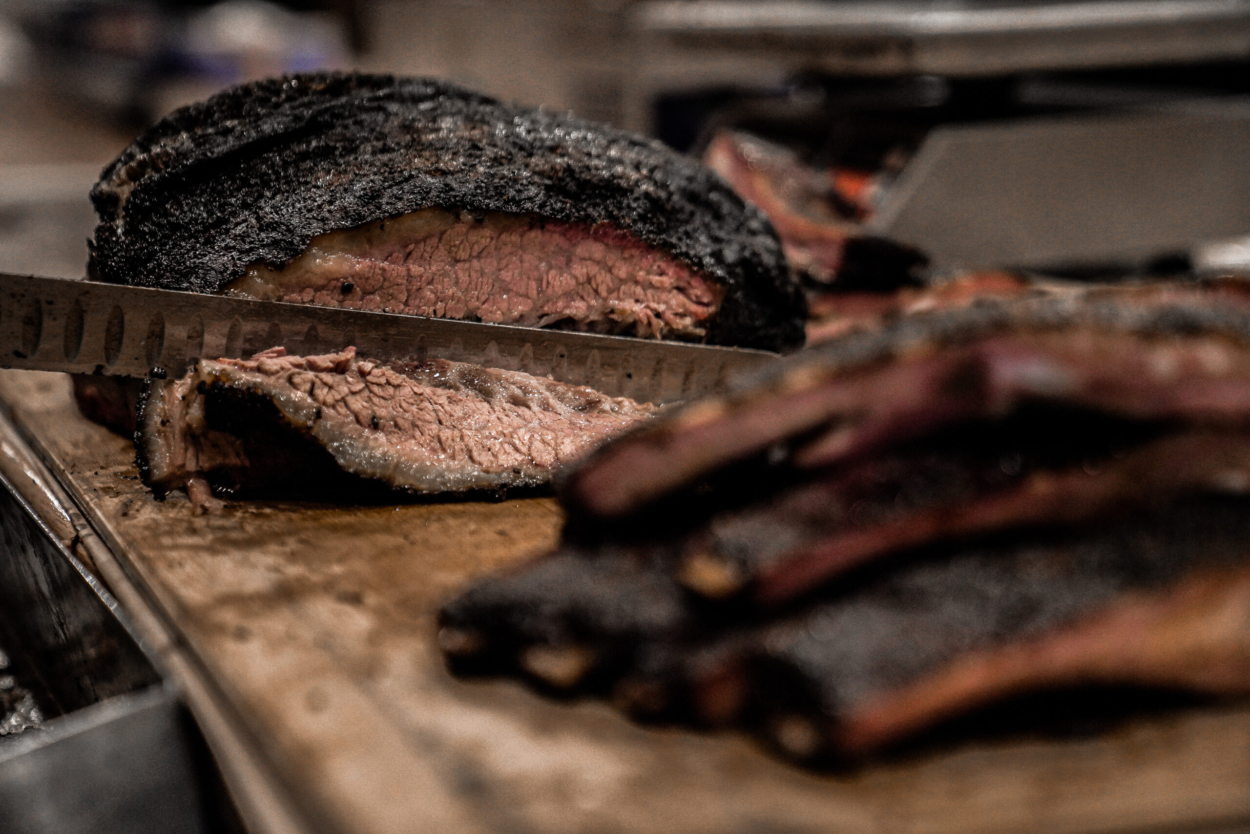 Jacks BBQ Slicing brisket and ribs